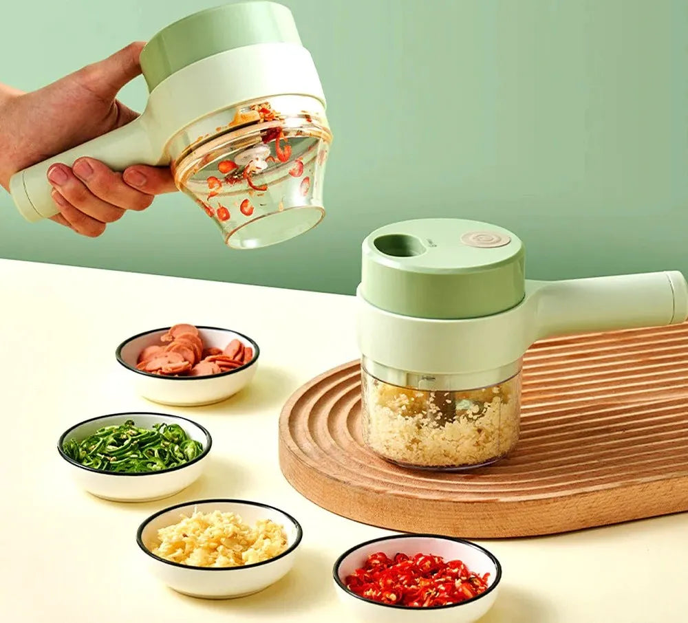 CORTADOR ELÉCTRICO DE ALIMENTOS 4 EN 1©